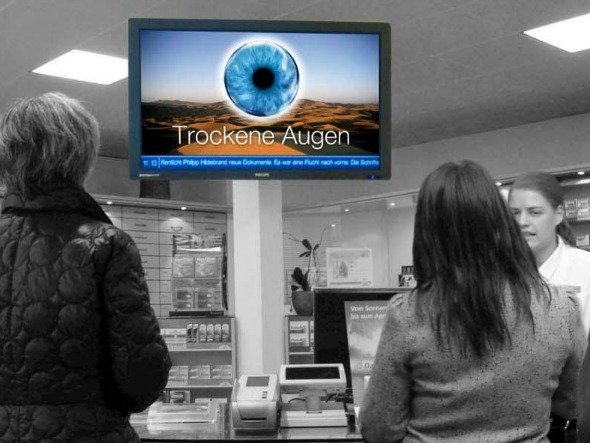 Werbebildschirm der Excom Media