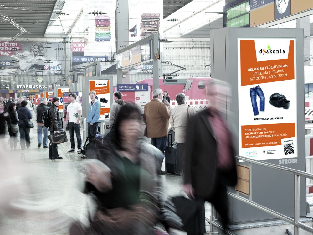 Diakonia Kampagne auf Station Video Screens in München (Foto: Kinetic)