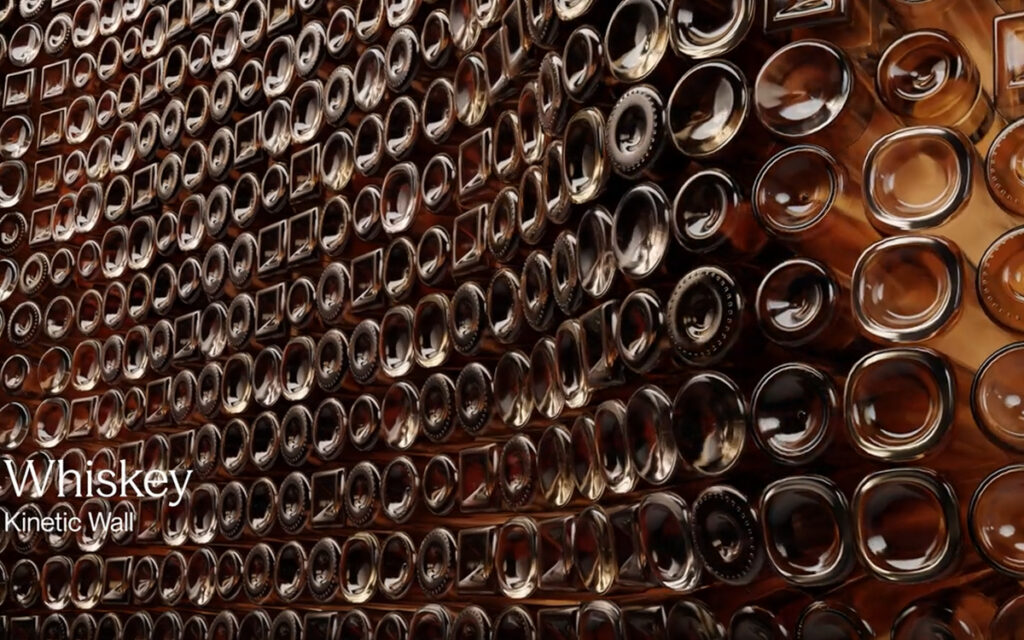 Kinetischer Content in Wellenbewegungen zeigt Whiskey-Flaschen. (Foto: Gentilehomme)